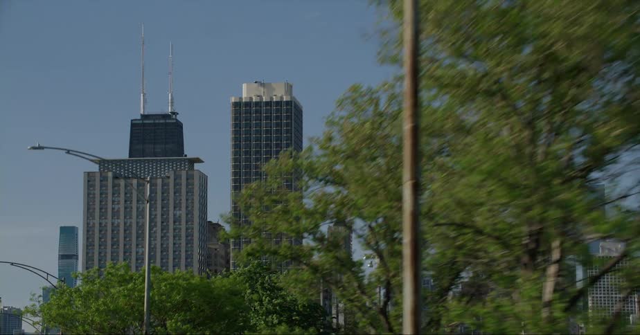 Tall skyscrapers on the chicago skyline under a bright blue sky at daytime