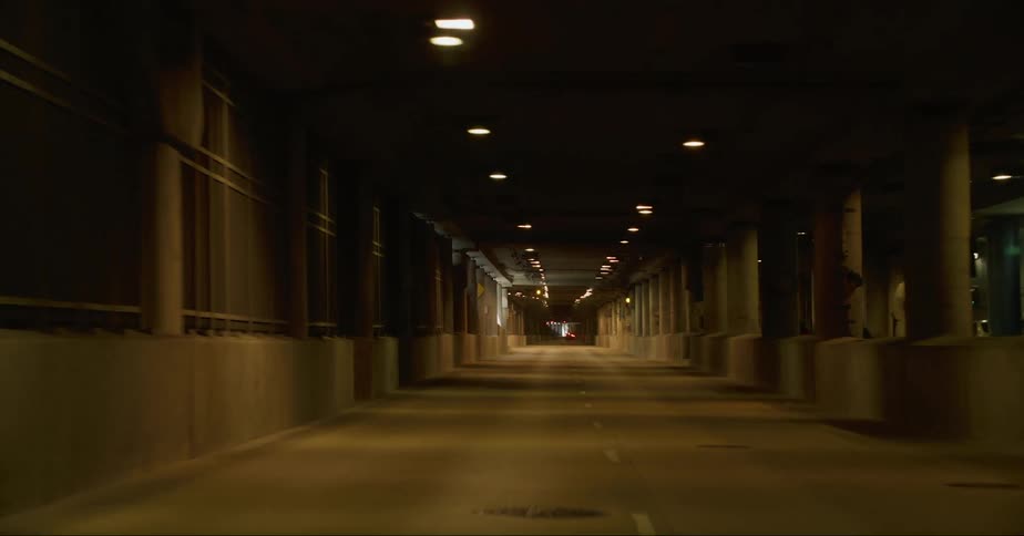 Cars are traveling through the tunnel