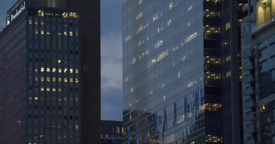 High rise office buildings in a city at dusk