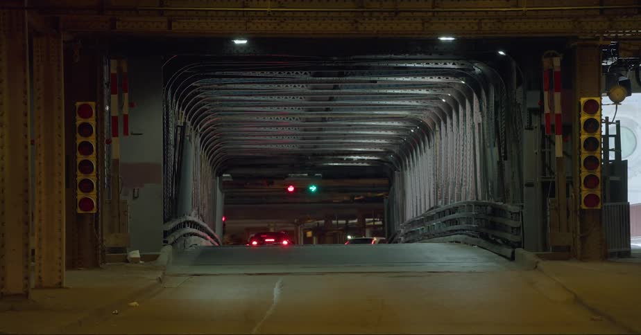 Black car waits at the entrance of parking garage underground