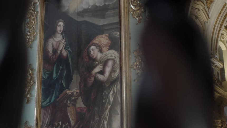 Paintings line the wall of this building