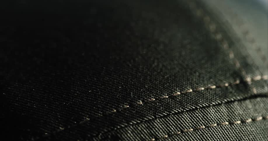 Denim fabric is neatly stitched together