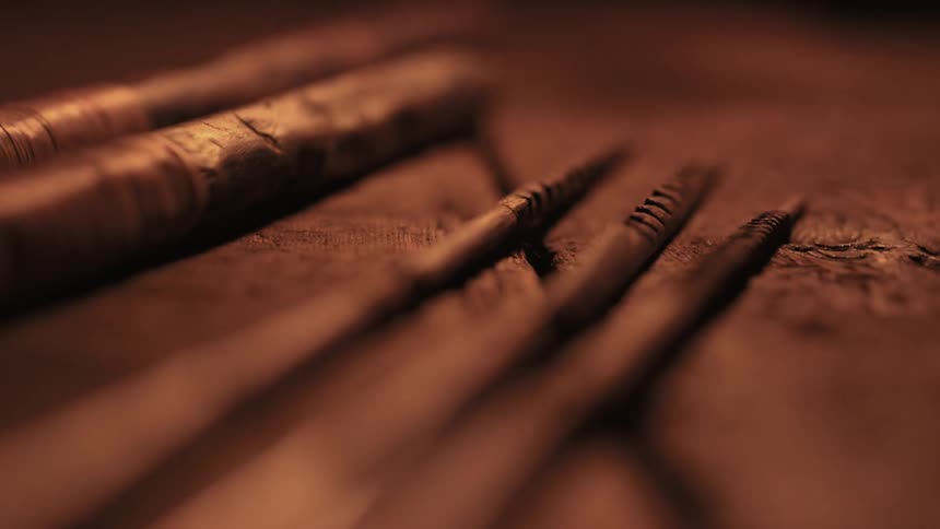 Tools lay across a wooden table