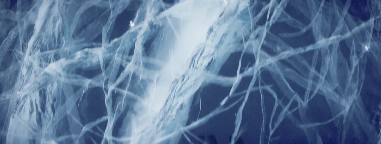 Close up of cracked icy lake Baikal