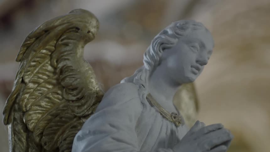 A statue of a praying angel