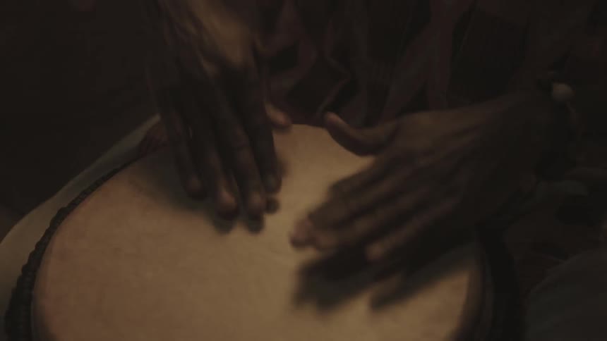 A person is drumming very fast