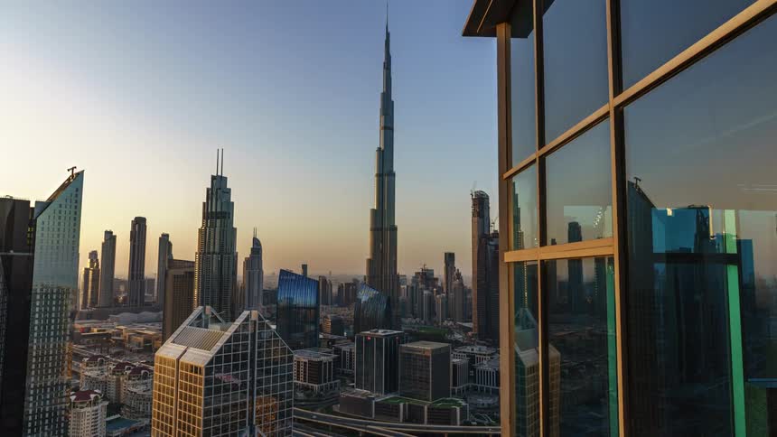 Time lapse view of a downtown city is displayed