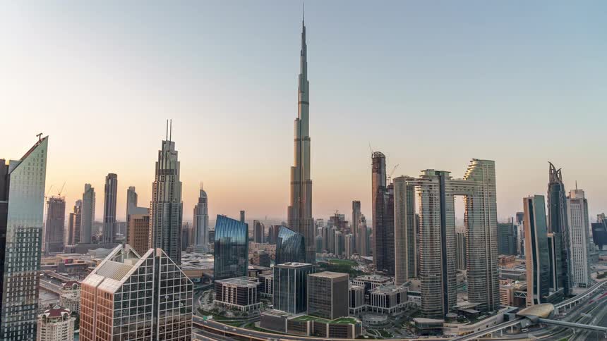 Modern tall skyscrapers and high rise buildings in the city during the day