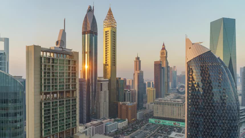 The innovative buildings and architecture of dubai with traffic packed streets