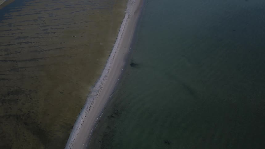 The water is calm near this coast line