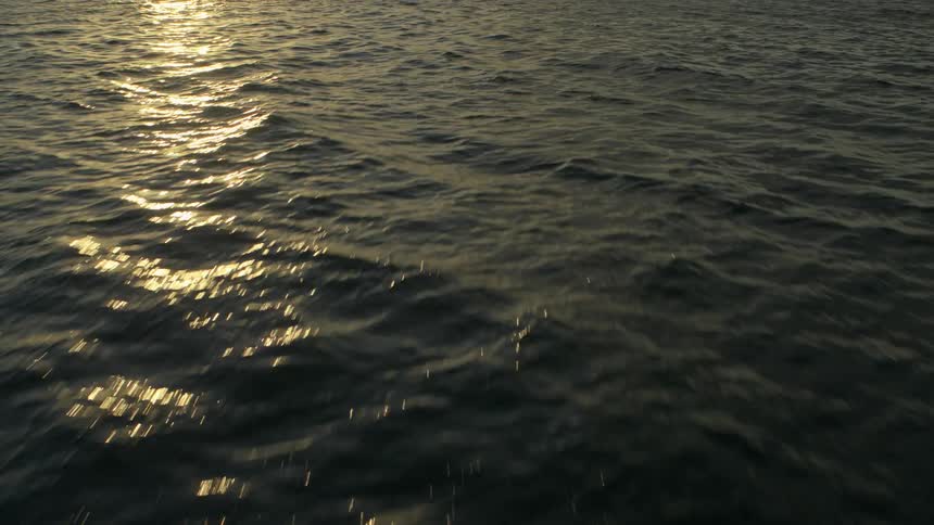 The sun is reflecting on the water
