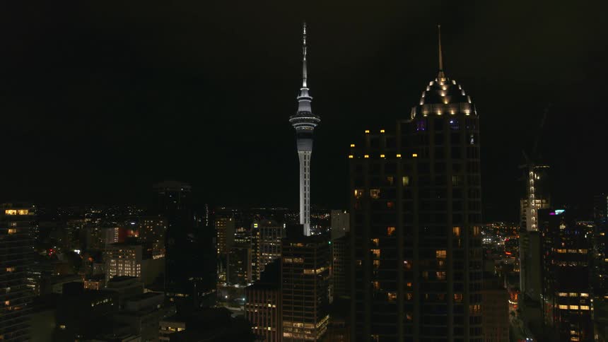 The view is of the downtown area and buildings at night time