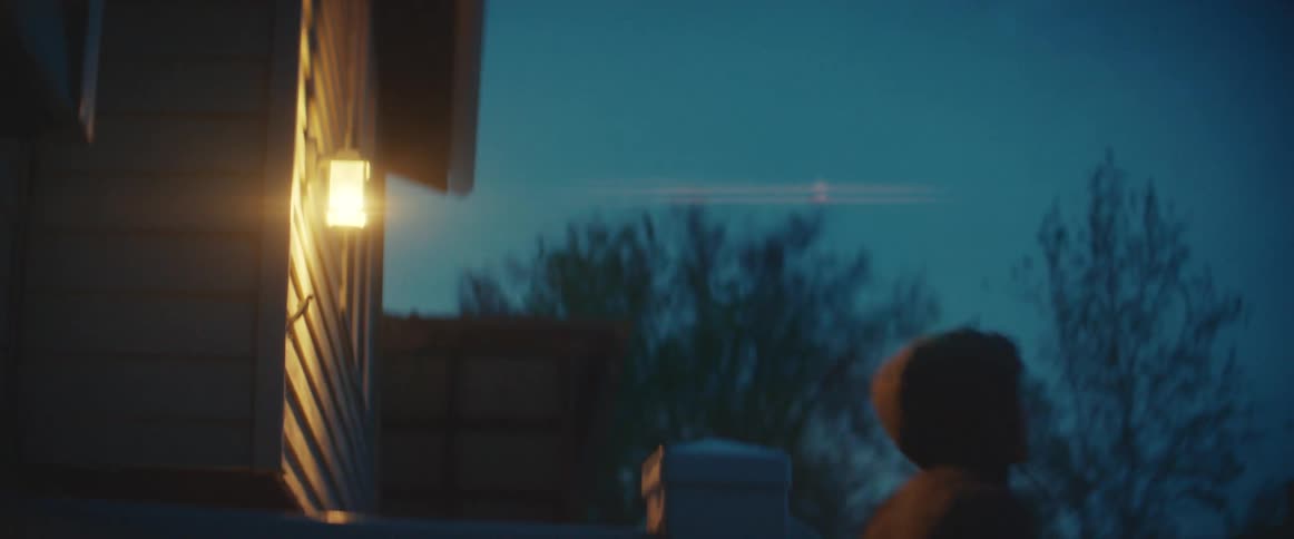 Young man wearing a hoodie goes out of the house to exercise in the early morning hours