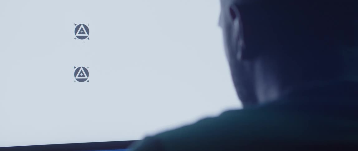 A man uses a software program on his computer