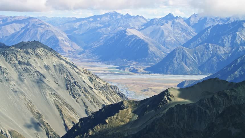 An aerial view of a mountain range in nature