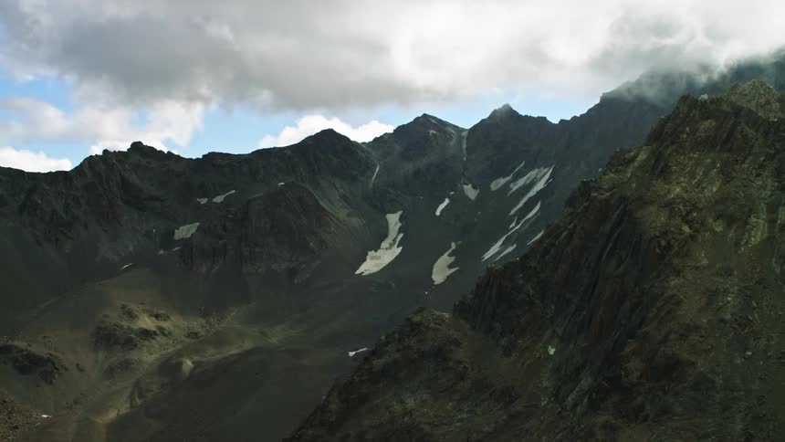 Aerial view of high mountain range and ridges