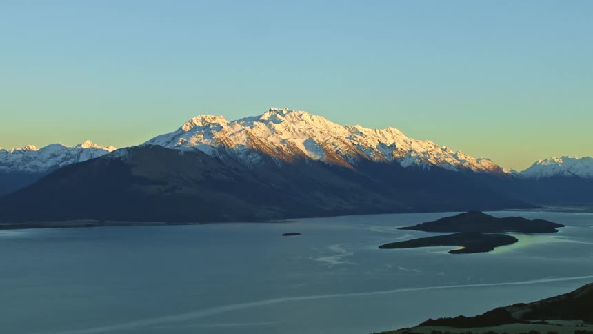 An aerial view of a mountain in the distance