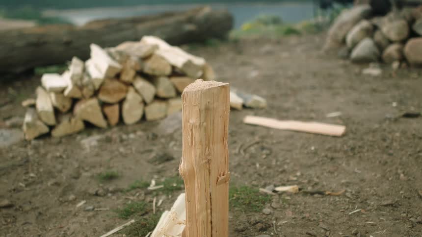 A person splitting wood