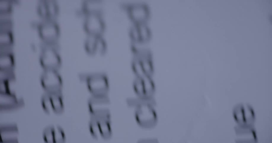 Extreme close up of the images and text on a magazine page
