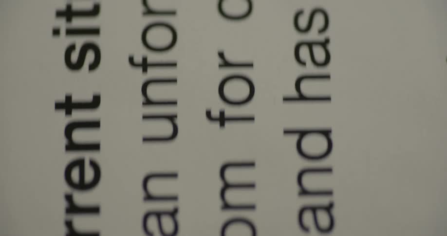 Extreme close up of words printed on white paper