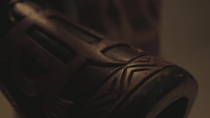 Carvings on the bottom of a bongo