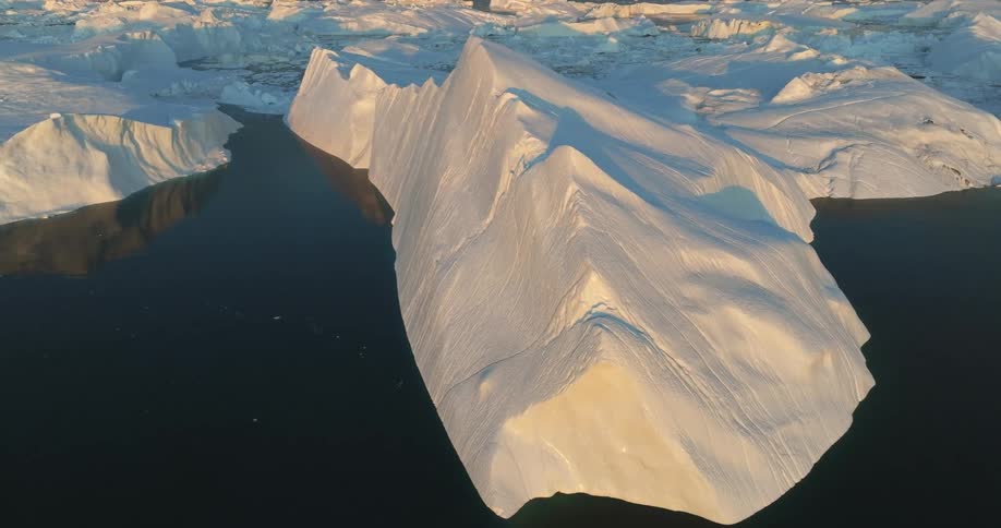 Aerial view of icebergs in the water