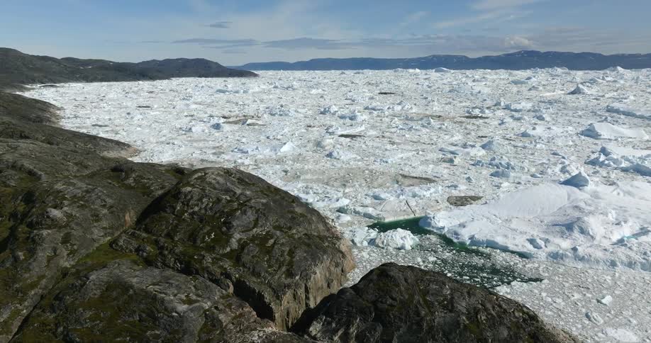 Aerial view of a large mass of ice that moves slowly in water