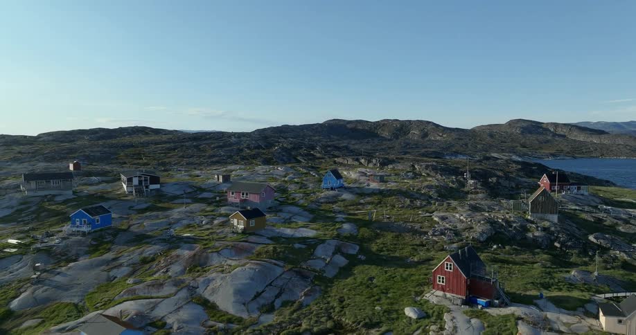 An aerial view of houses on the coast