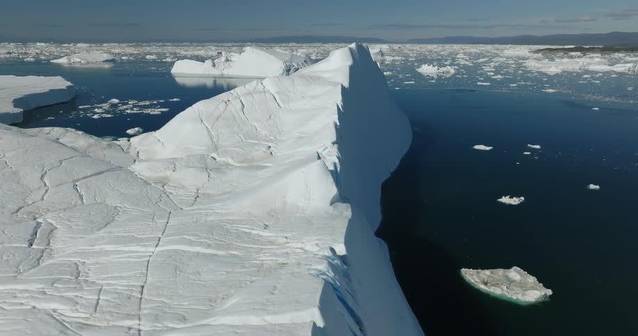 Large blocks of ice are in he water