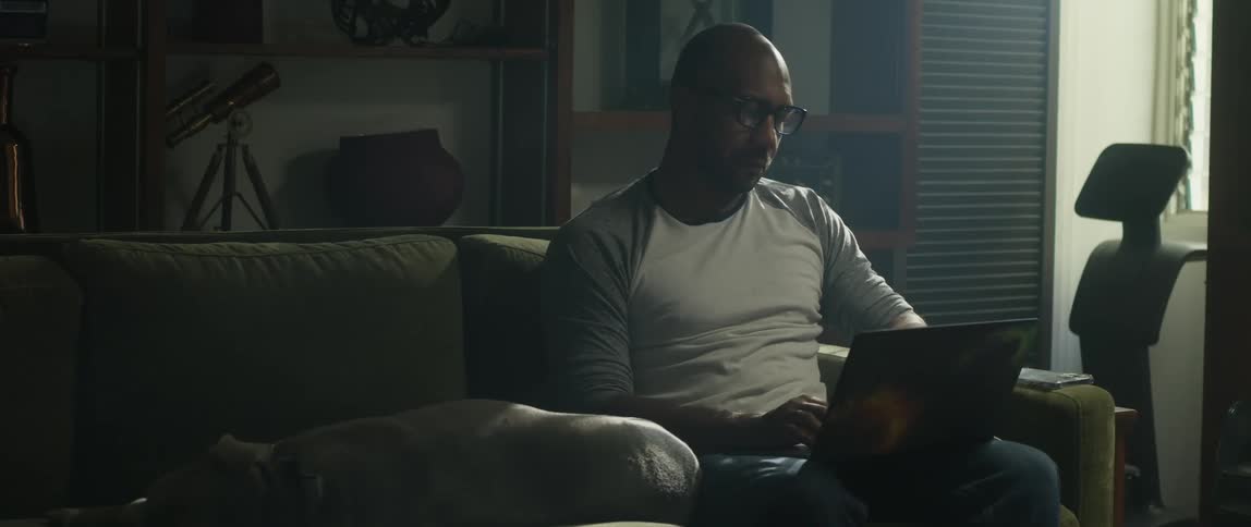 A man is typing on his keyboard