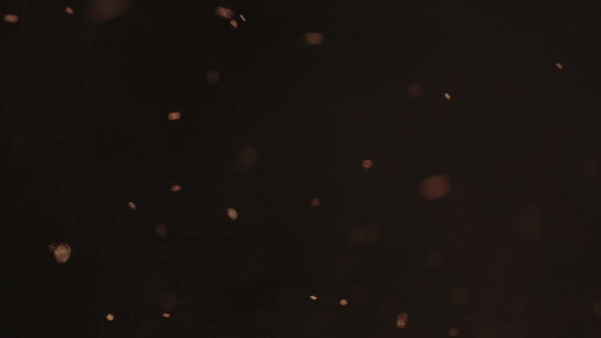 Sparks fly in a dark area