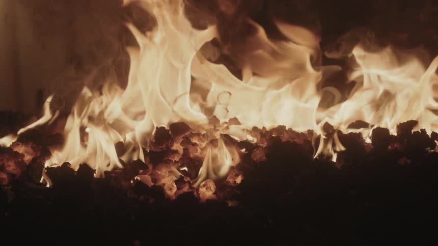 Coals burn bright in this fire