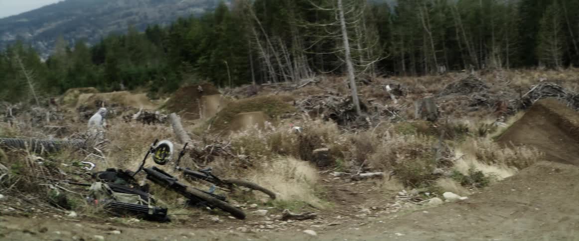 A person jumping bikes on a track