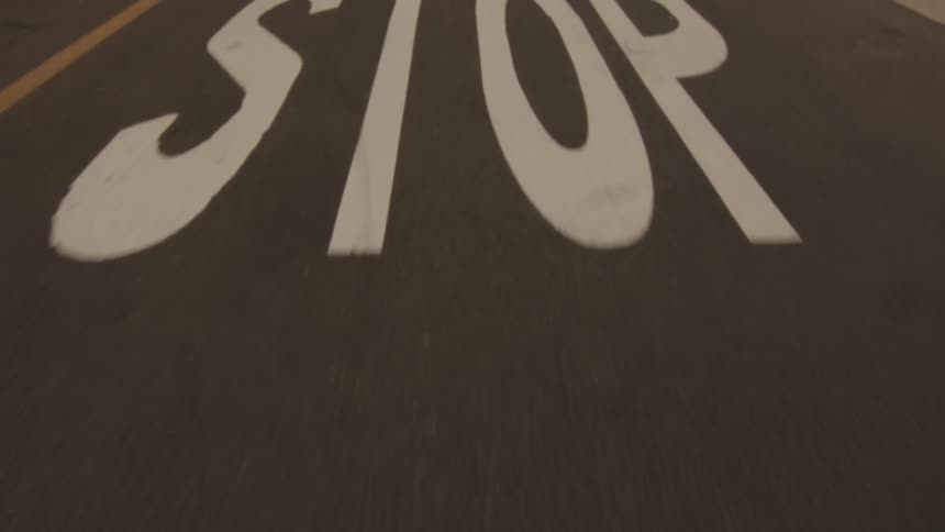 Traveling on a road marked to stop ahead
