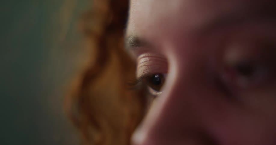 Close up of womans eyes looking at smartphone screen