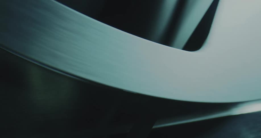 The tape reel of a reel to reel player is turning