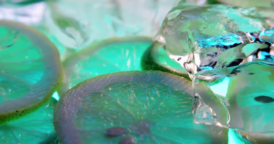 Limes lying in ice for a photo shoot