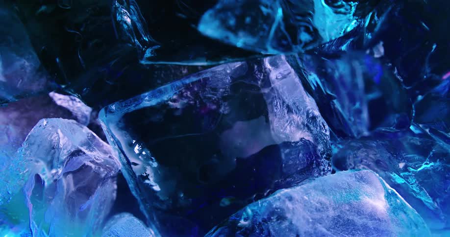 Blueberries and ice cubes intermingle in water