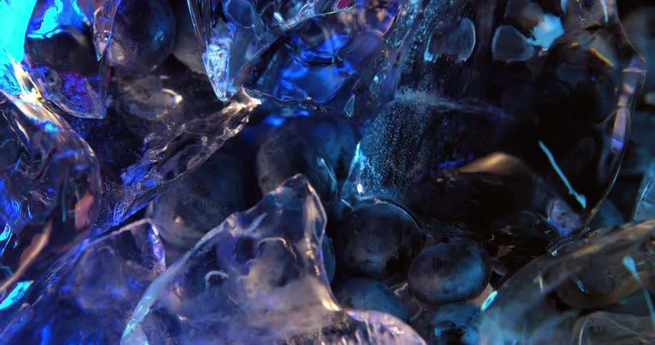 Close up of ice cubes and blueberries