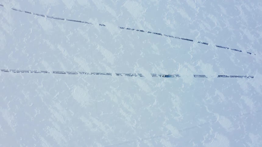 Cable lines are frozen under ice and snow