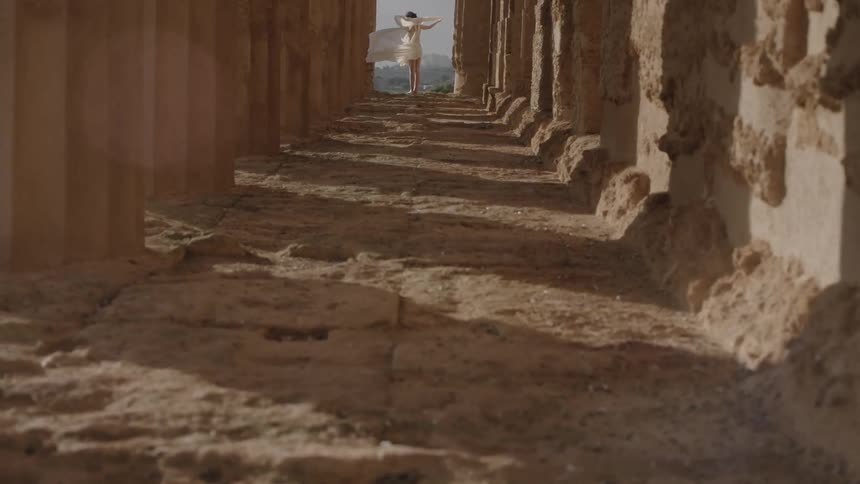The path leads to a woman ahead
