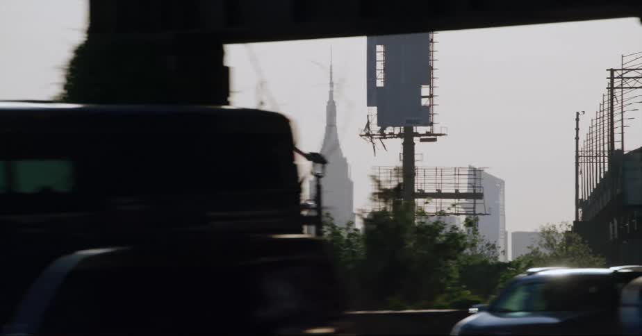 The traffic is stopped on the road by the city