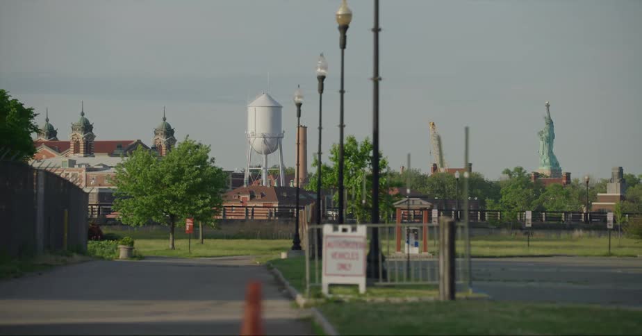 The statue of liberty is in the distance