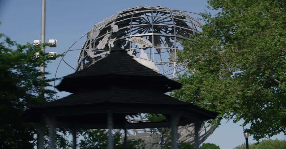 The unisphere located in new york city seen from a moving car at daytime