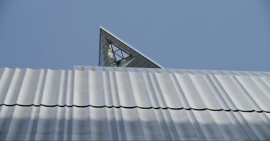 Exterior view of triangular building in downtown