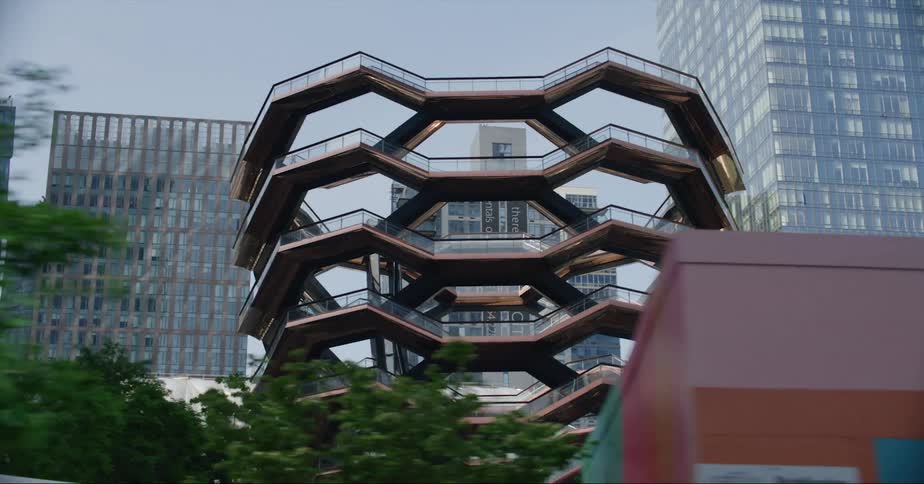 A walk way between high rise office buildings in a city