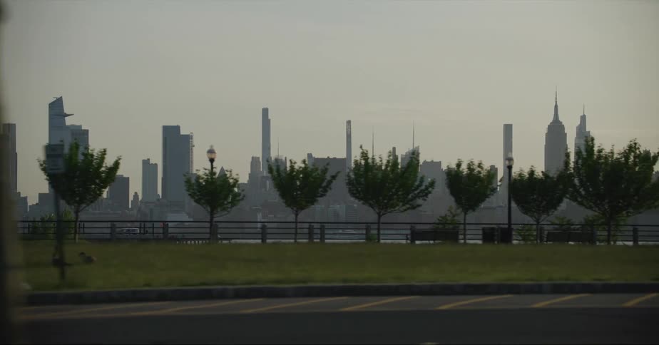 Cars are parked outdoors during the spring