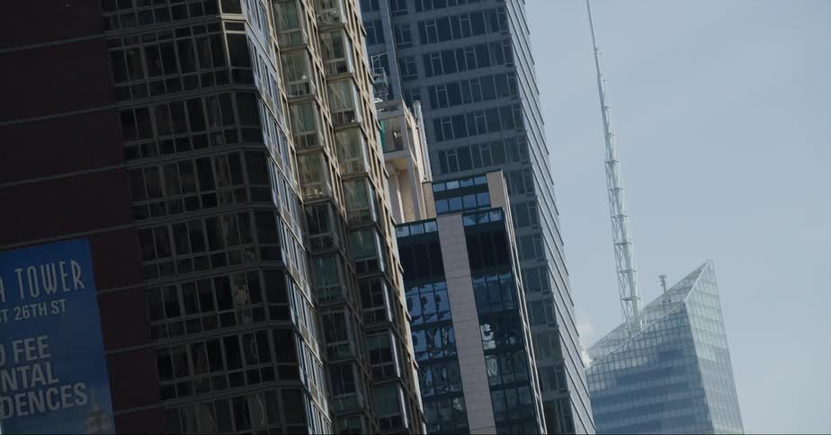 Modern skyscrapers fill a city block