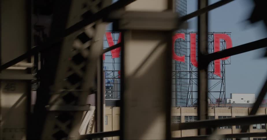 Steel beams and buildings in a city in the daytime