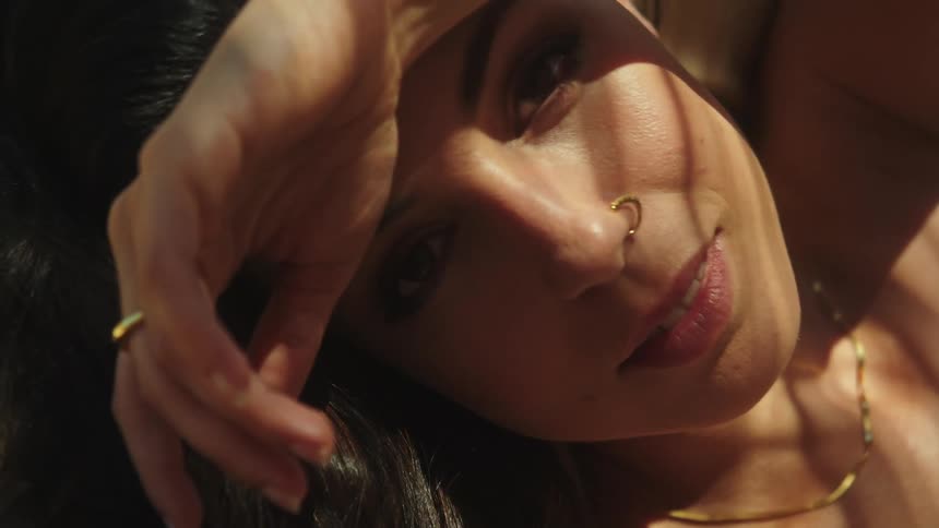 Close up view of a persons face is displayed